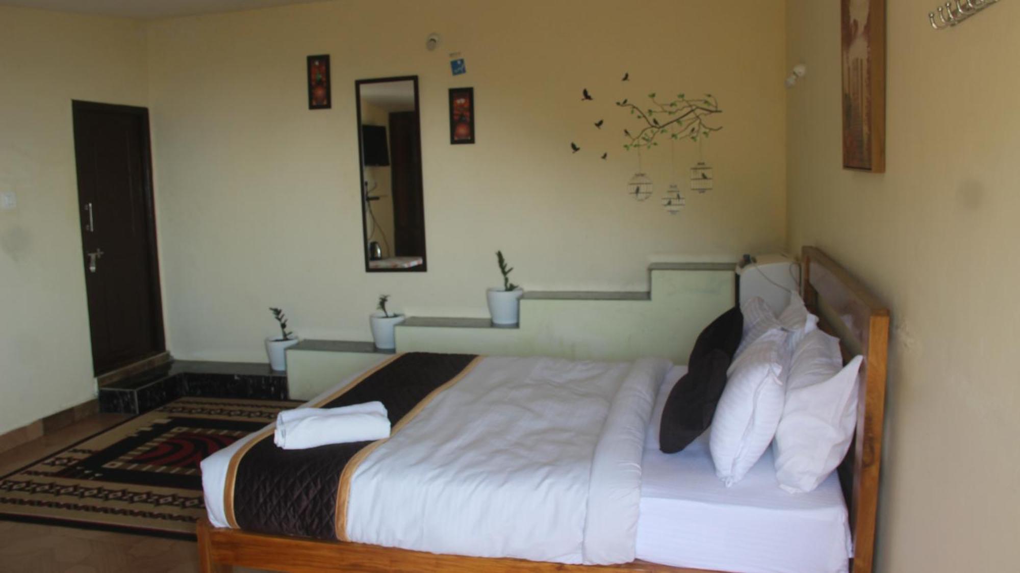 Kollanoor Guest House Madikeri Oda fotoğraf